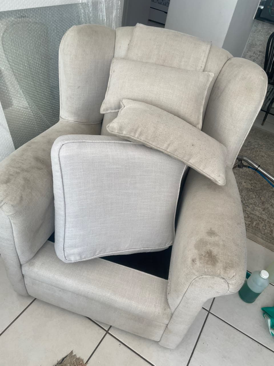 Upholstered armchair before cleaning